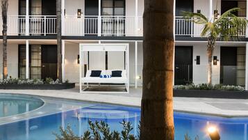 Outdoor pool, free pool cabanas, pool umbrellas