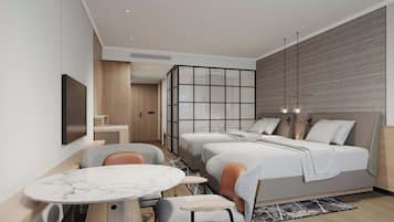 A modern hotel room with a bed, two bedside tables, a seating area with chairs, a TV, and a large window.