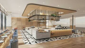 A modern interior with a central counter, seating areas, and a patterned floor.