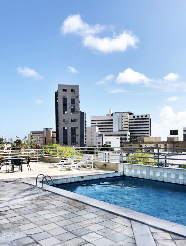 Indoor pool, outdoor pool, open 6:00 AM to 10:00 PM, pool umbrellas