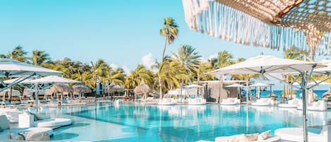 3 outdoor pools, open 8:00 AM to 8:00 PM, pool umbrellas, pool loungers