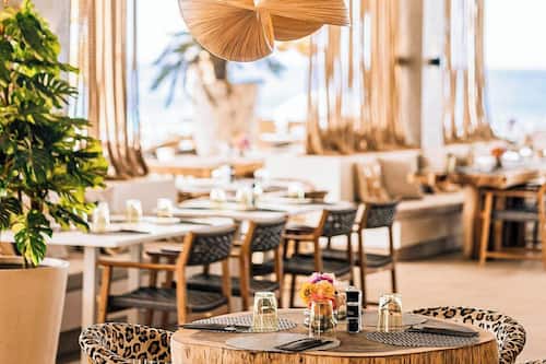Breakfast, lunch, dinner served; international cuisine, beach views