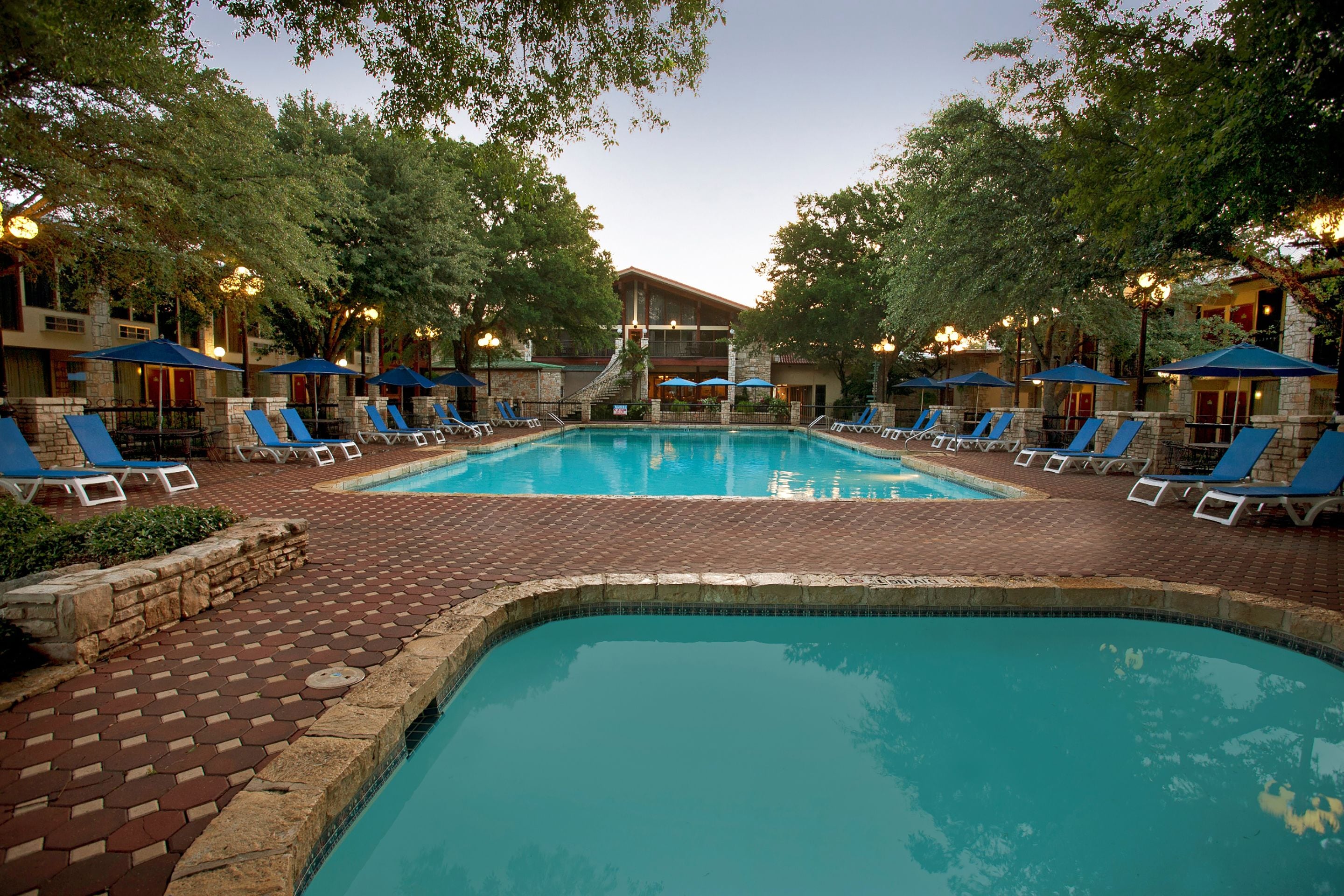 2 outdoor pools, open 10:00 am to 10:00 pm, pool umbrellas
