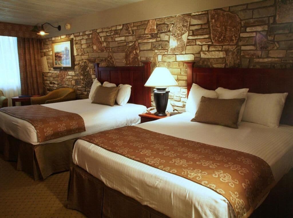 deluxe room, 2 queen beds | down duvets, blackout curtains, iron/ironing board