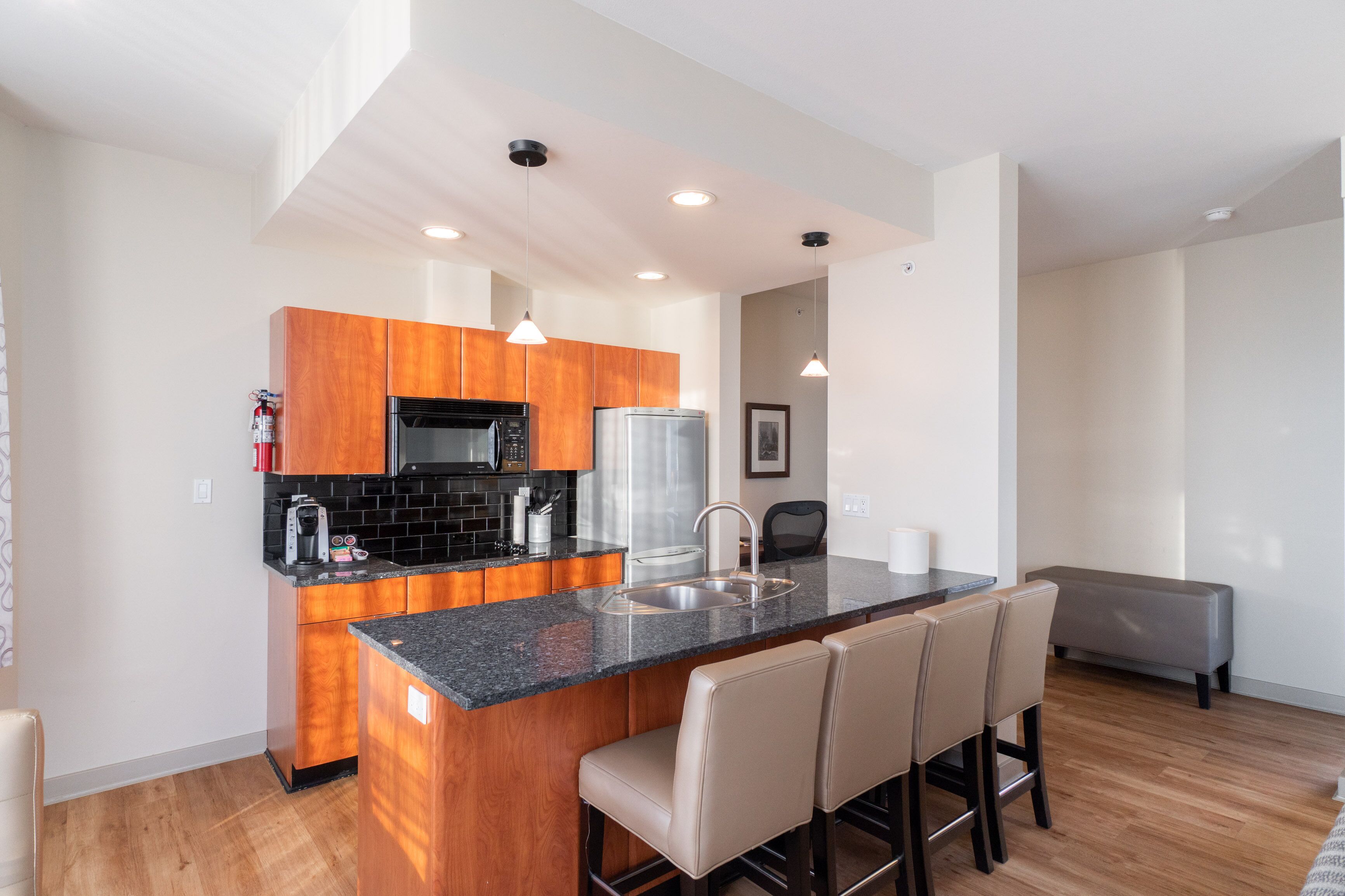 suite, 1 bedroom, jetted tub | private kitchen | fridge, coffee/tea maker