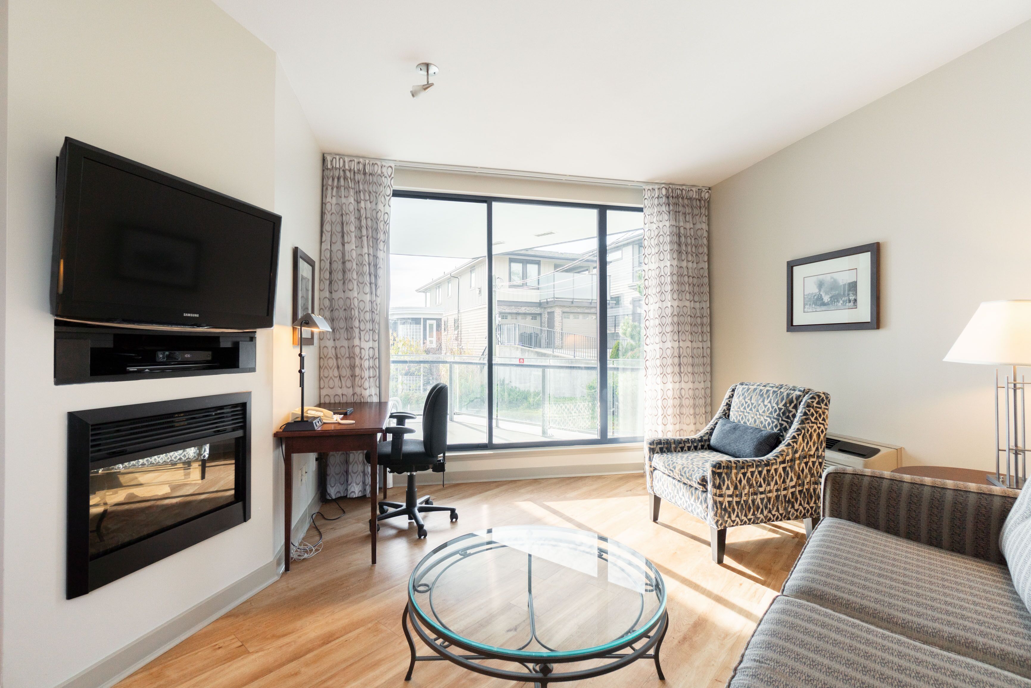 Suite, 2 Bedrooms | Living area | 40-inch flat-screen TV with cable channels, TV, iPod dock