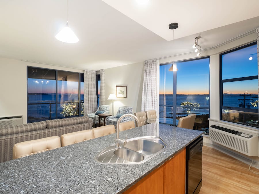 Suite, 1 Bedroom, Jetted Tub | Living area | 40-inch flat-screen TV with cable channels, TV, iPod dock