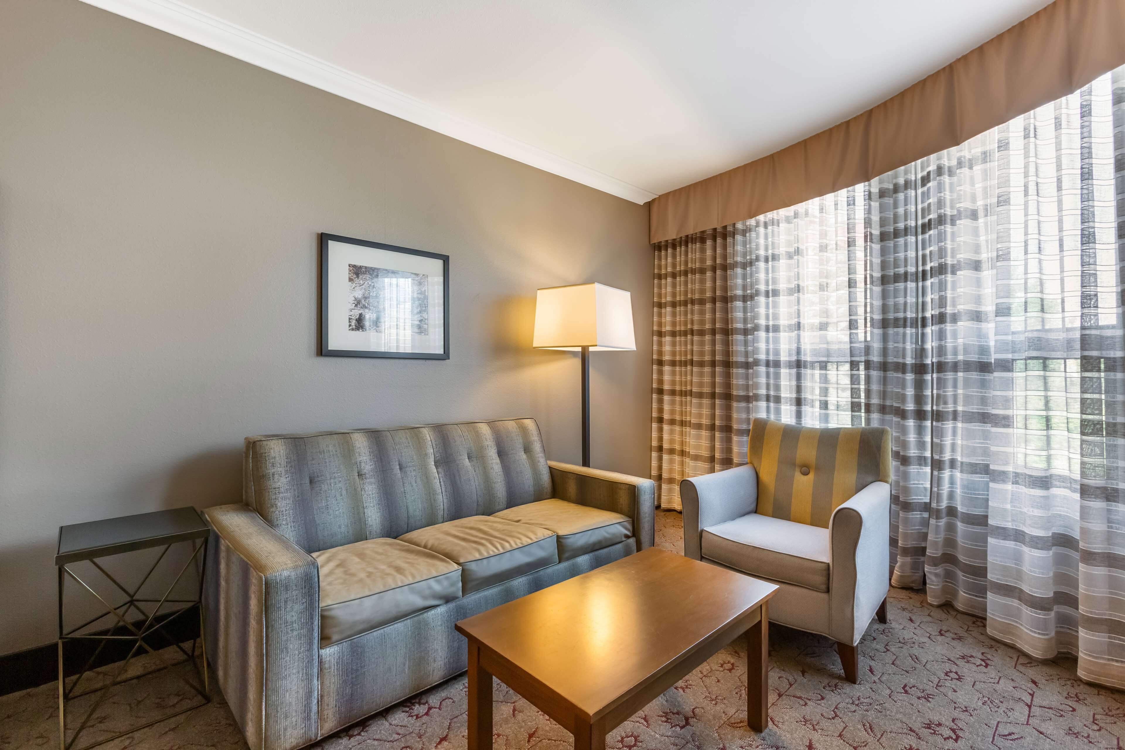 standard room, 2 queen beds, non smoking, refrigerator & microwave | in-room safe, desk, iron/ironing board, free rollaway beds