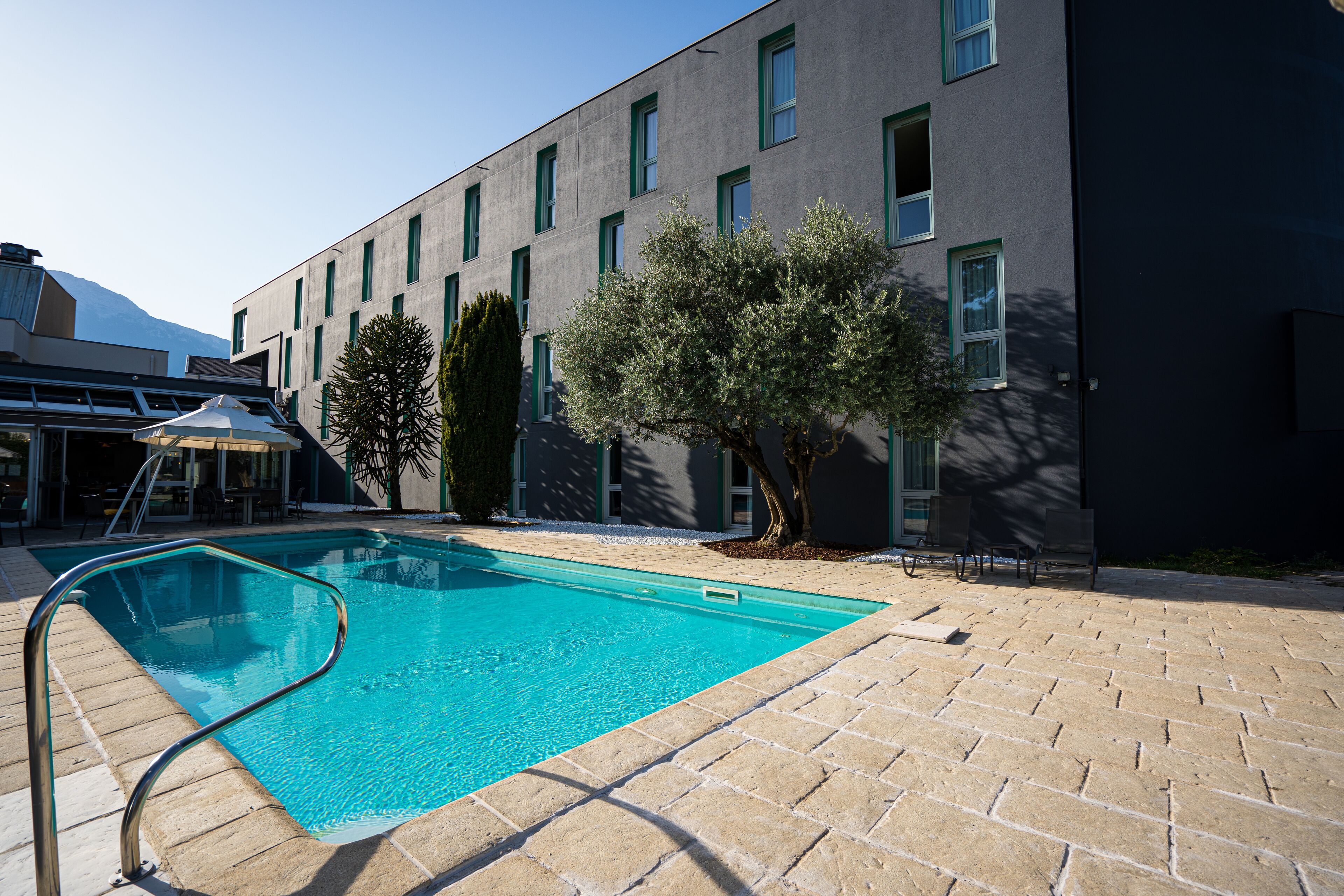 seasonal outdoor pool, pool umbrellas, pool loungers