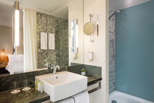 Shower, eco-friendly toiletries, hair dryer, towels