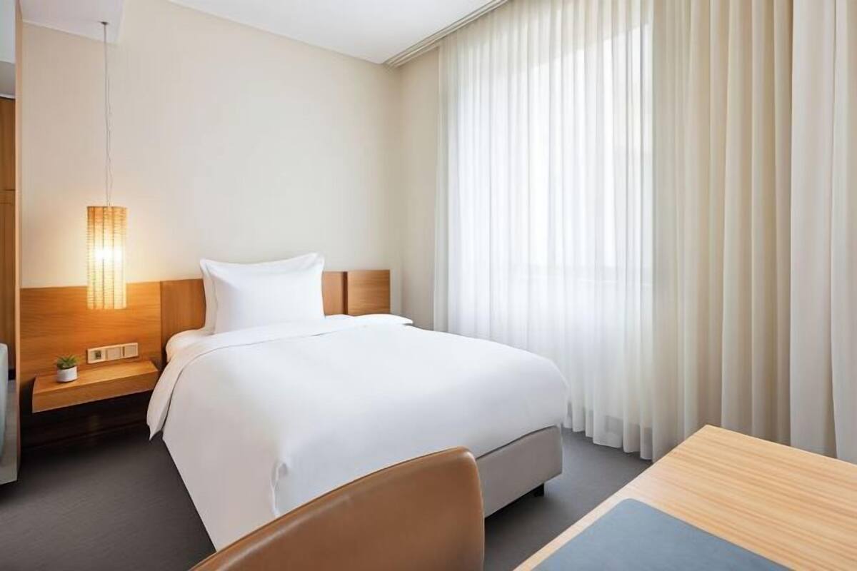 Minibar, desk, laptop workspace, blackout curtains