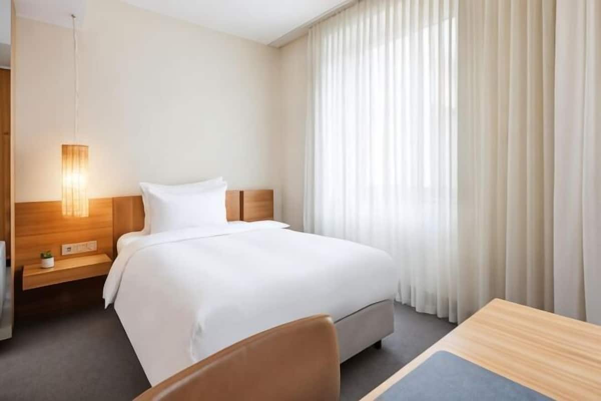 Minibar, desk, laptop workspace, blackout curtains