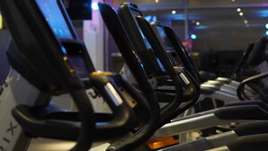 A row of stationary bikes with digital screens, likely in a gym or fitness center. - Lindner Hotel Berlin Ku’damm, part of JdV by Hyatt (Berlin)