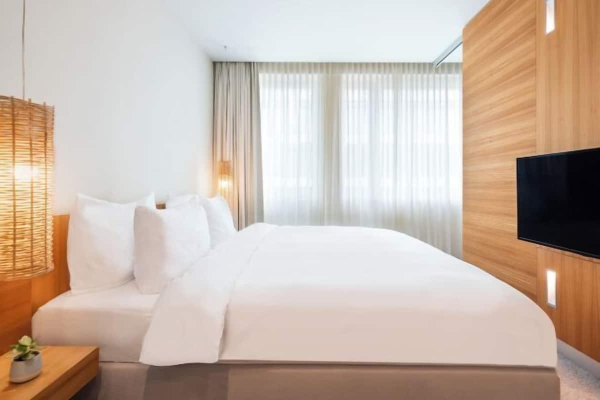 Minibar, desk, laptop workspace, blackout curtains