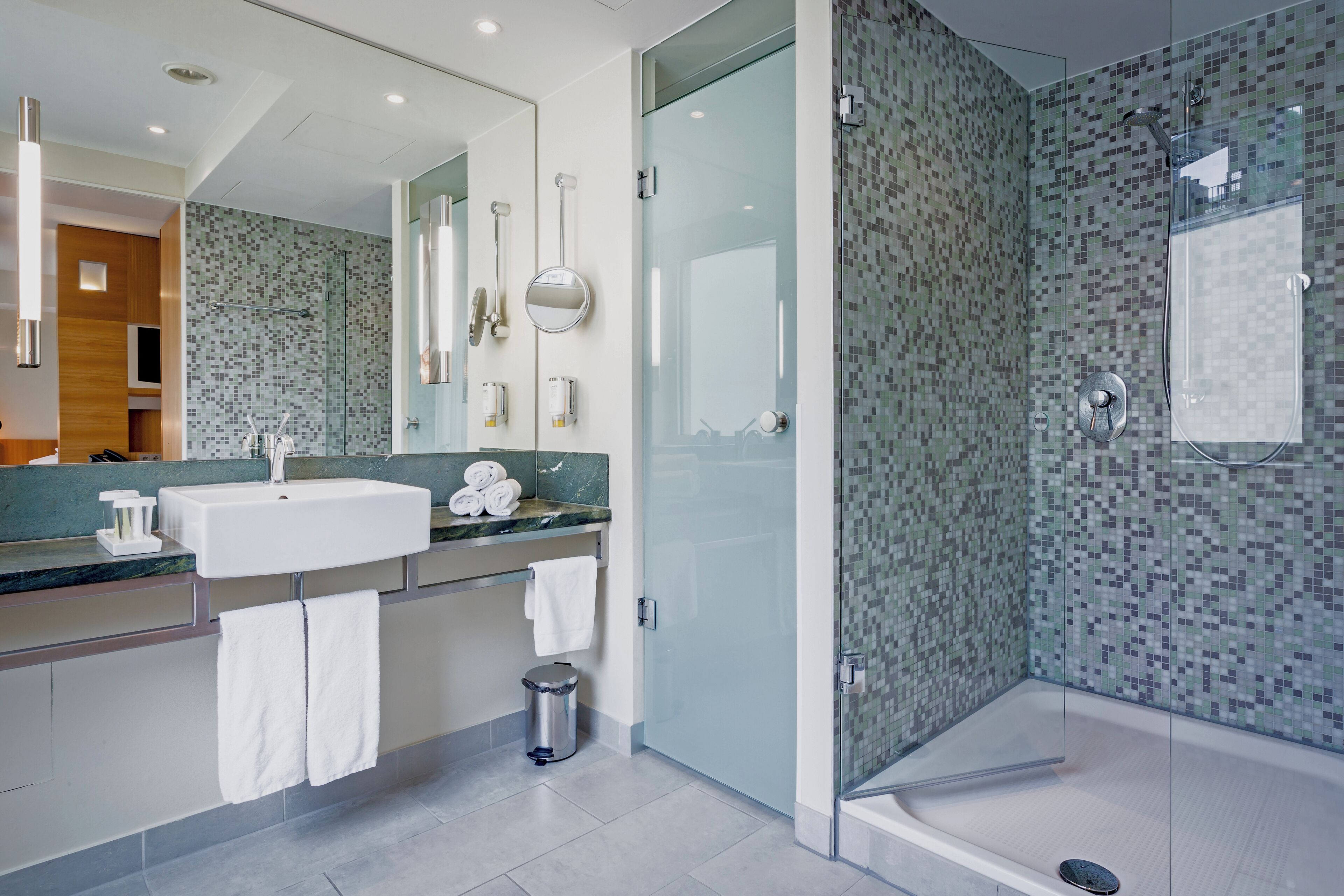 shower, eco-friendly toiletries, hair dryer, towels