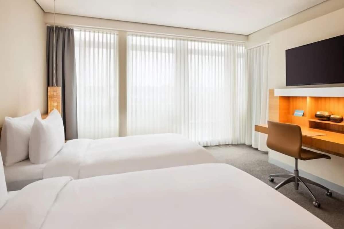Minibar, desk, laptop workspace, blackout curtains