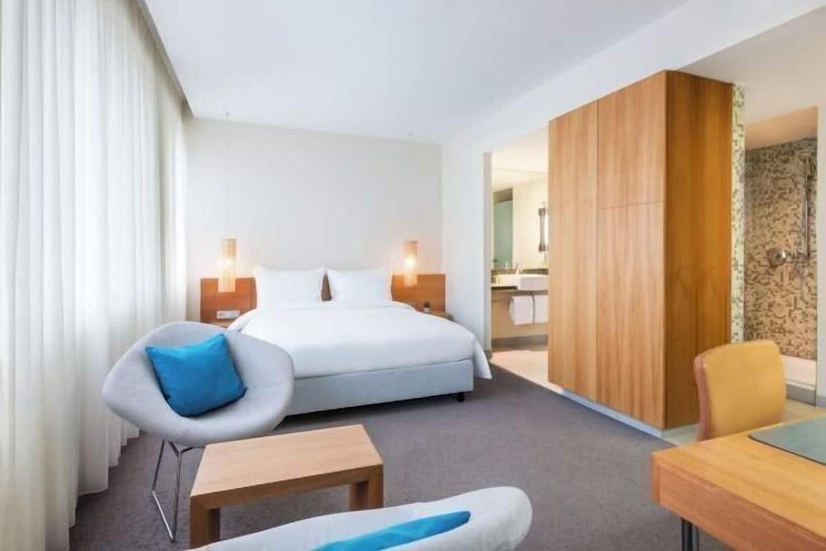 Minibar, desk, laptop workspace, blackout curtains