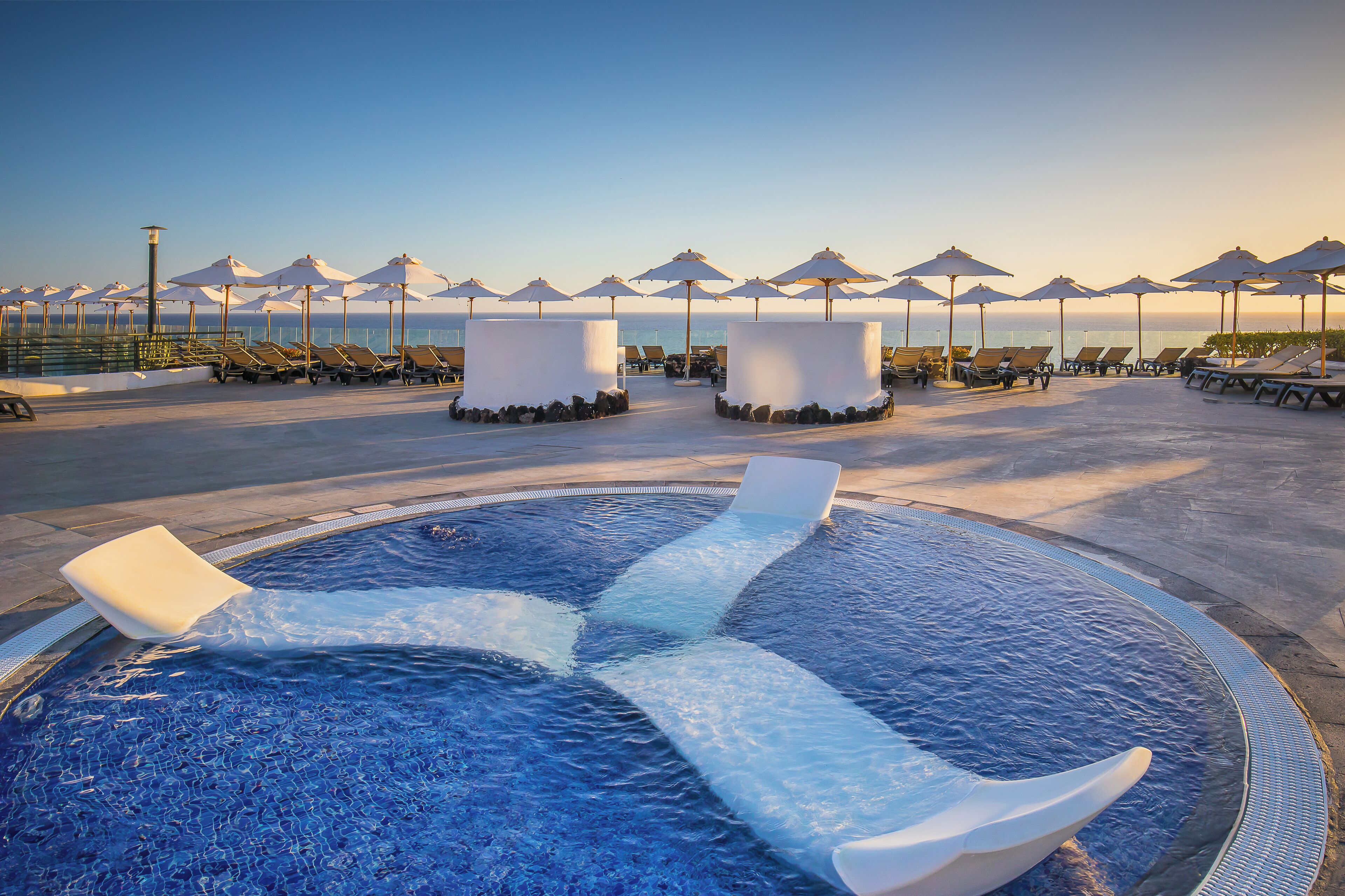 3 outdoor pools, pool umbrellas, sun loungers