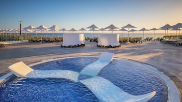 3 outdoor pools, pool umbrellas, sun loungers