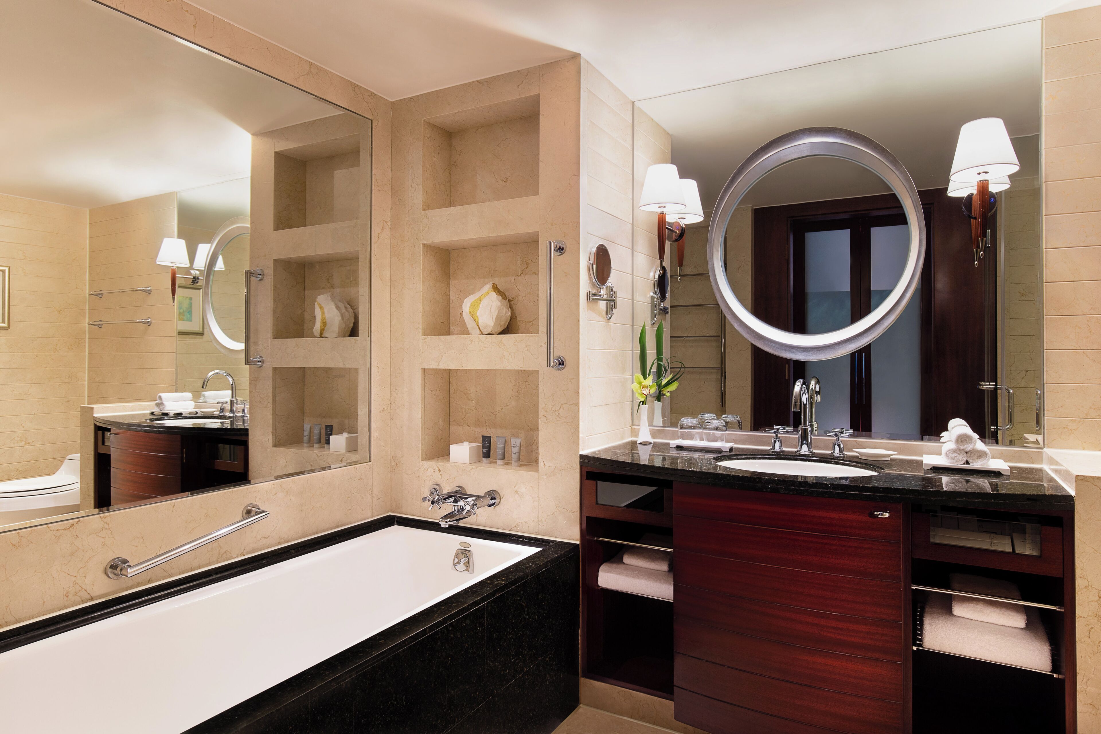 separate bathtub and shower, deep-soaking bathtub, designer toiletries