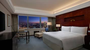 Ropa de cama de alta calidad, edredones de plumas, minibar y caja fuerte