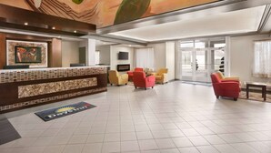 A hotel lobby with a reception desk, seating area, and a mural on the ceiling. - Days Inn by Wyndham Leamington (Leamington)