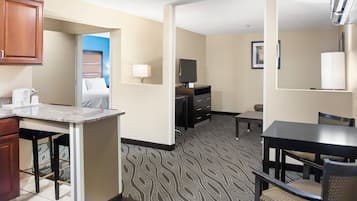 Suite, 1 King Bed, Non Smoking | In-room safe, desk, blackout drapes, iron/ironing board