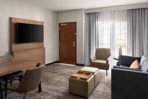 Standard Suite One King and One Sofa Bed Non-Smoking | Living area | 55-inch Smart TV with cable channels, Netflix, streaming services - Embassy Suites by Hilton at Hot Springs Convention Center (Hot Springs)