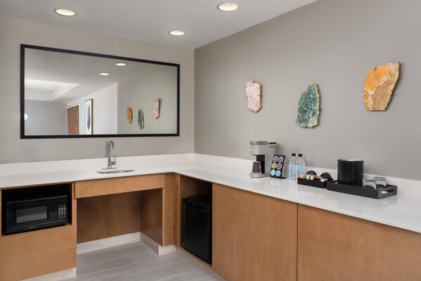 Fridge, microwave, coffee/tea maker, dining tables