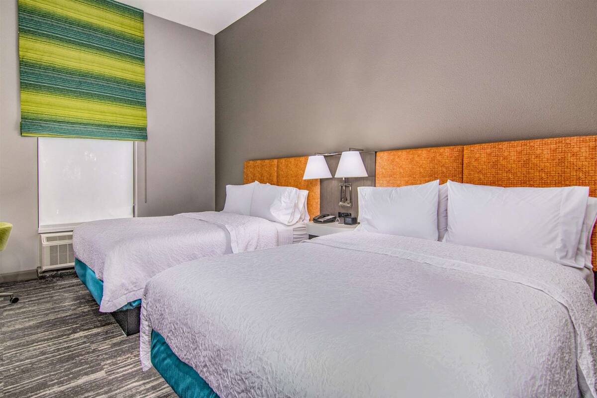 premium bedding, desk, laptop workspace, blackout curtains