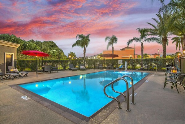 Outdoor pool, open 9:00 AM to 10:00 PM, sun loungers