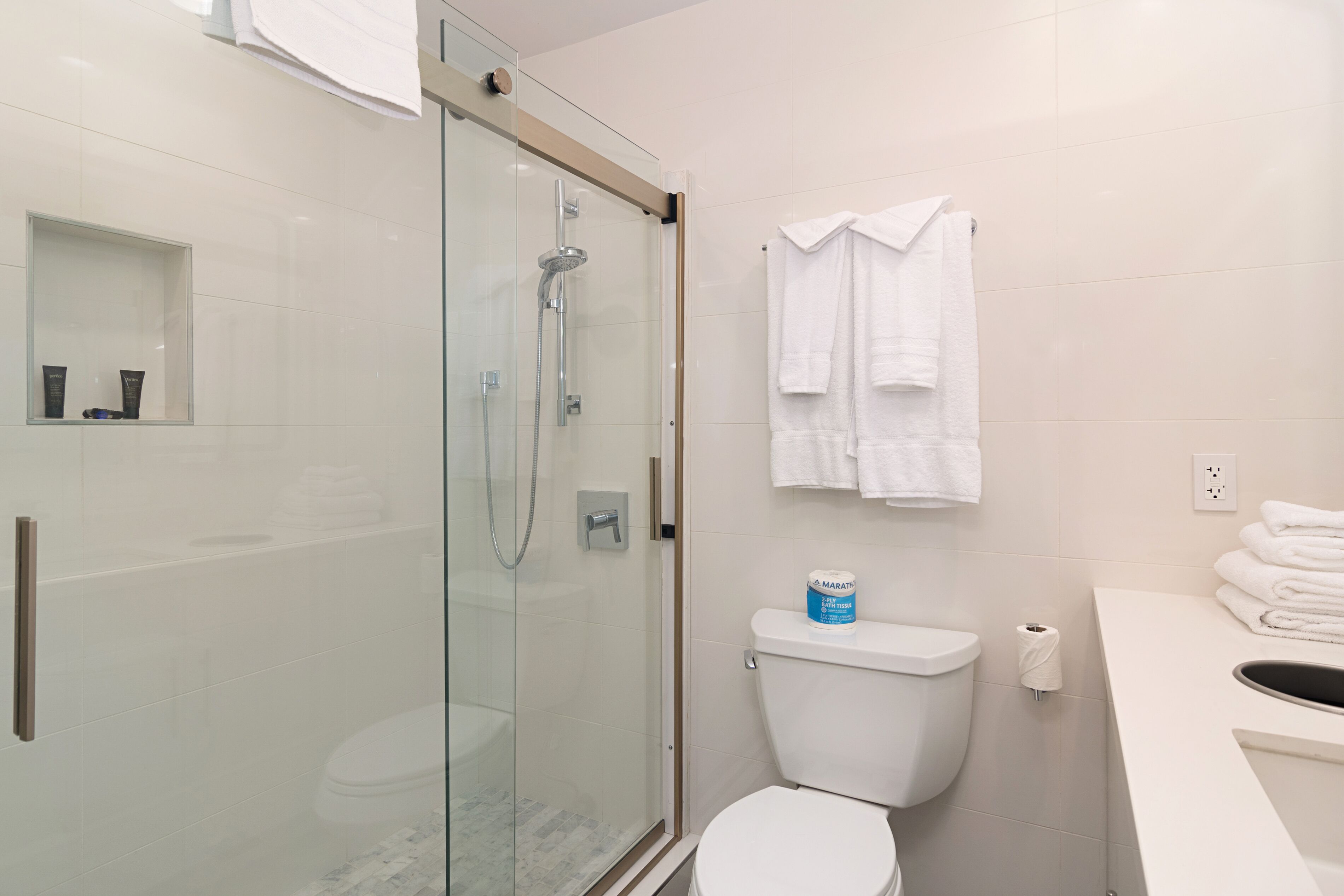 shower, free toiletries, hair dryer, towels