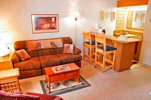Flat-screen TV, fireplace, table tennis