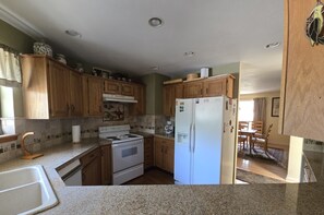 Family Apartment | Private kitchen | Fridge, microwave, oven, stovetop