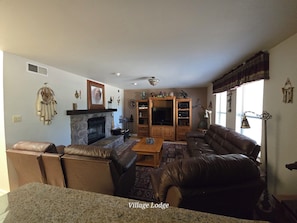 Family Apartment | Living area | Flat-screen TV, fireplace, table tennis