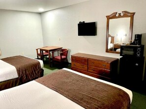 Premium bedding, individually furnished, desk, iron/ironing board - Star City Inn & Suites (Star City)