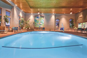 Indoor pool, open 7:00 AM to 10:00 PM, pool loungers