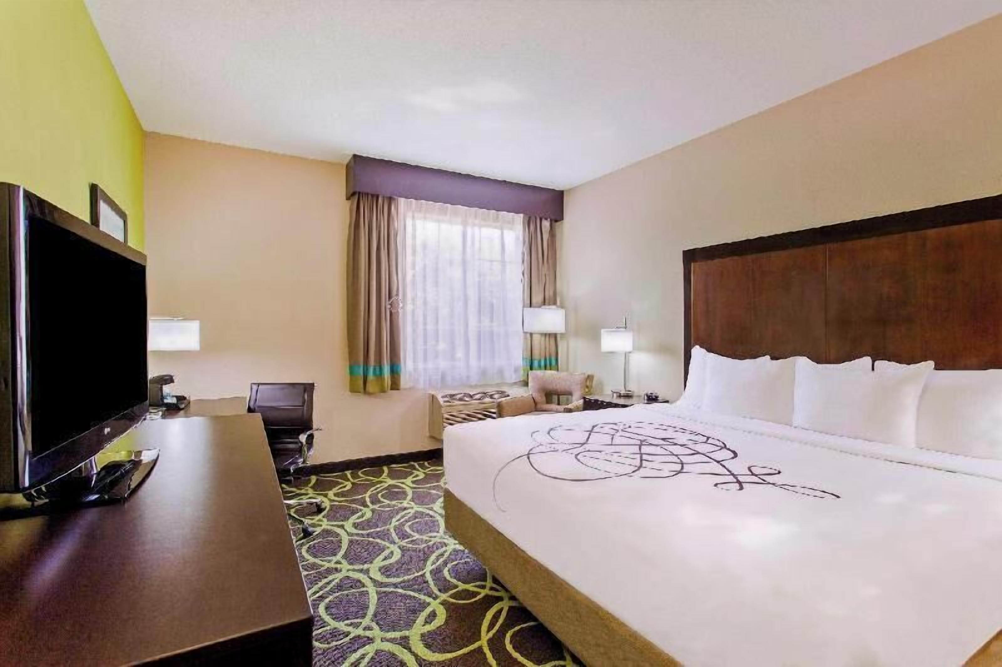 Premium bedding, desk, blackout curtains, iron/ironing board