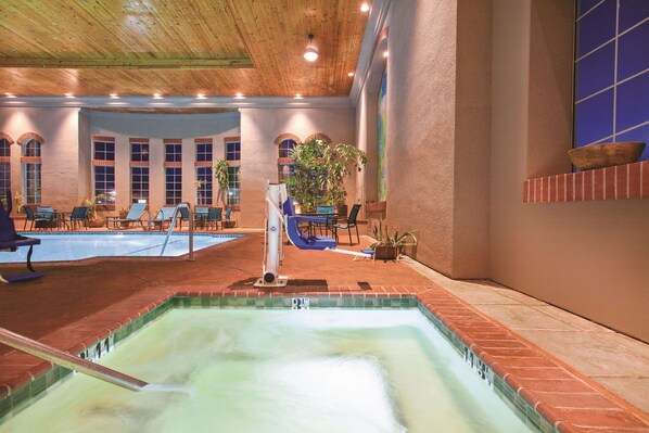 Indoor pool, open 7:00 AM to 10:00 PM, pool loungers