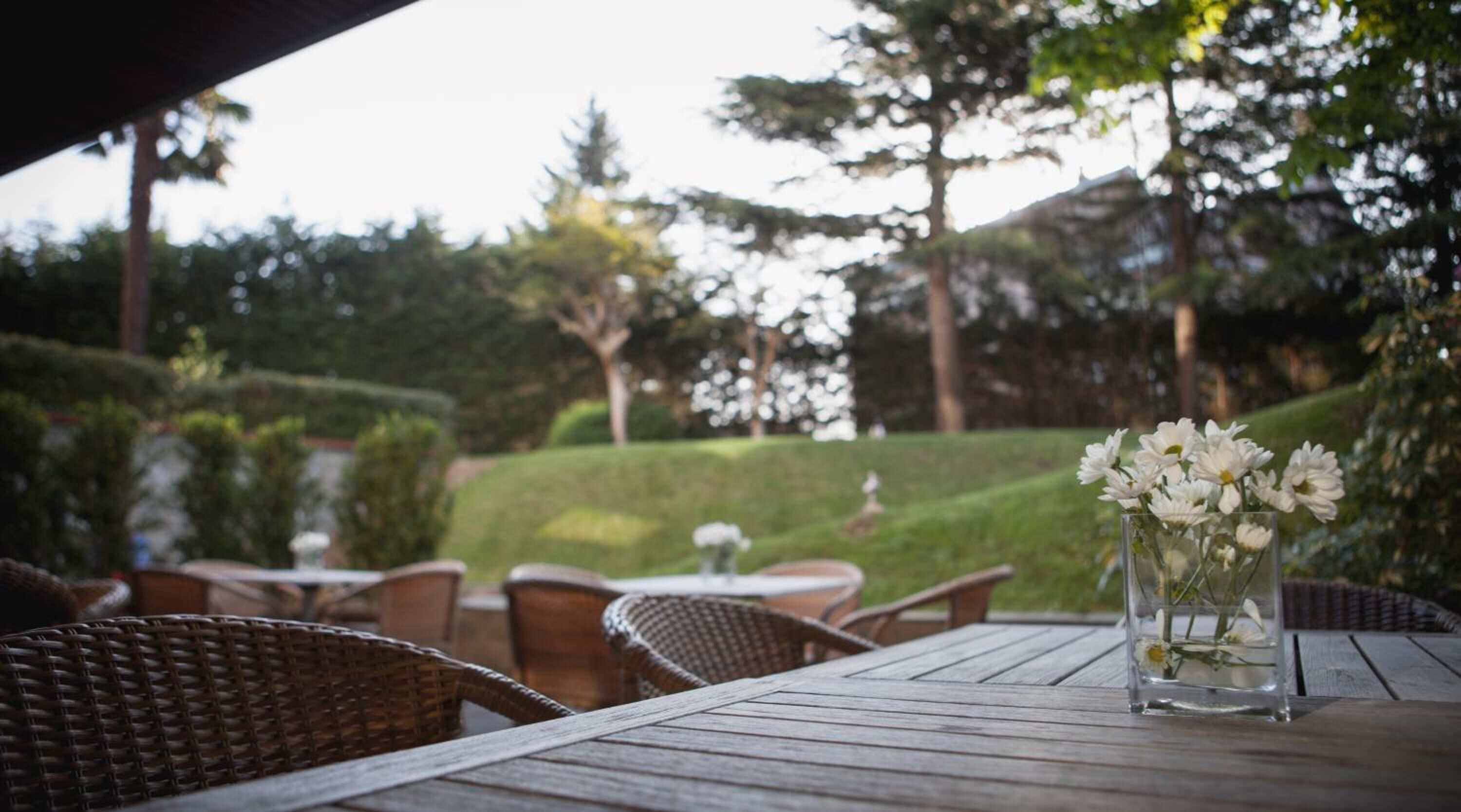 breakfast, lunch, dinner served; garden views