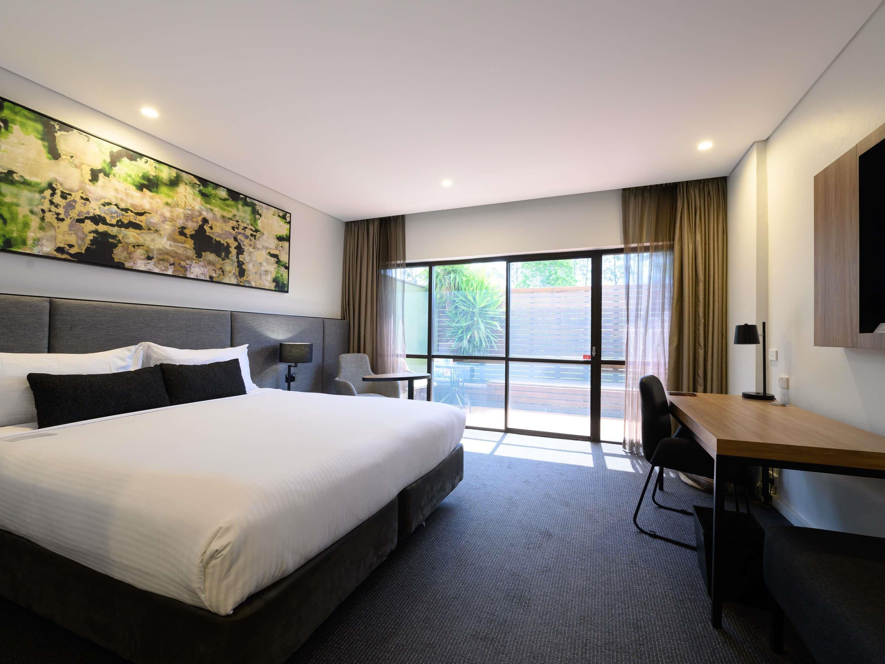 Room, 1 King Bed, Courtyard Area | In-room safe, desk, soundproofing, iron/ironing board