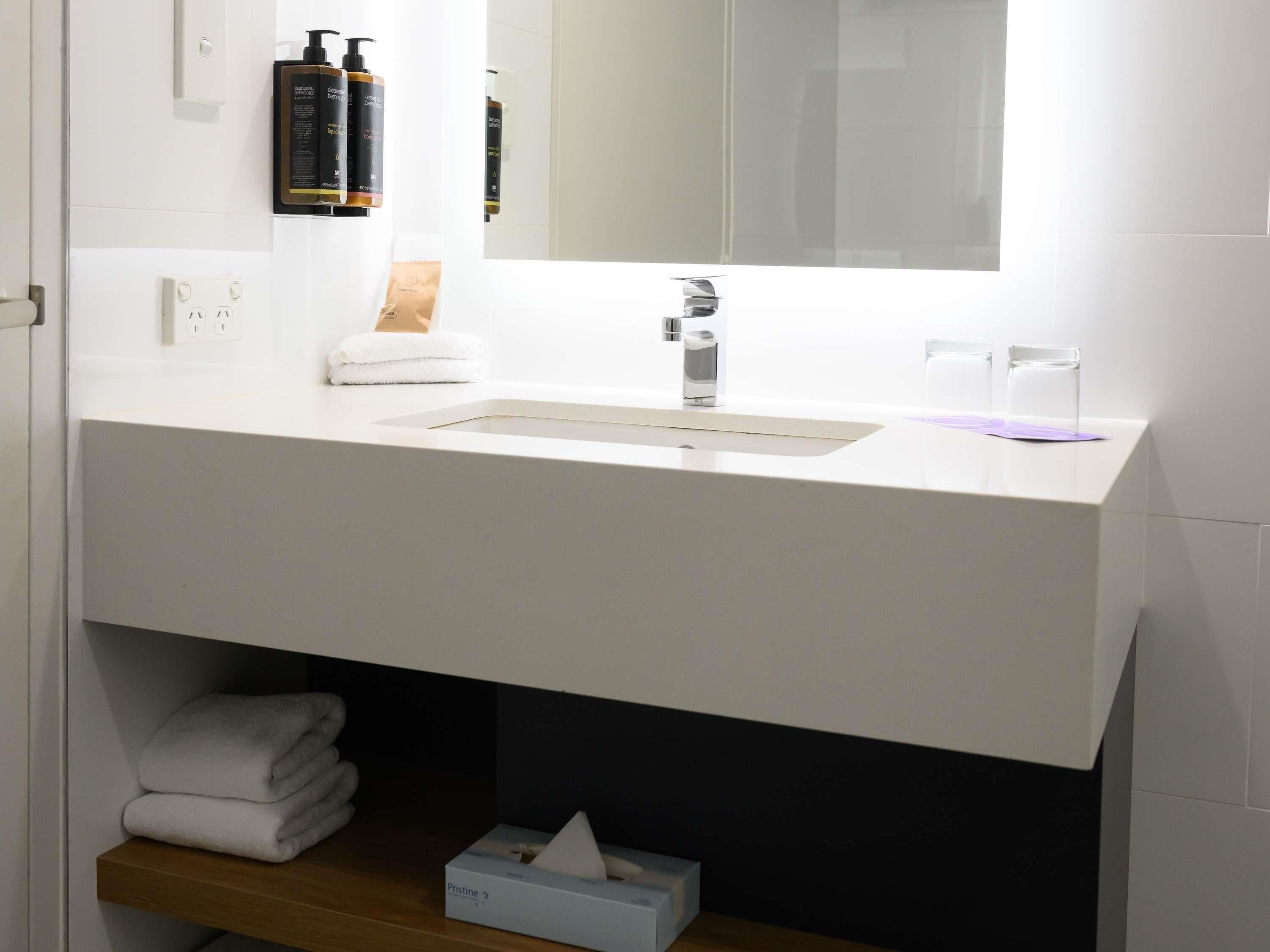 Shower, eco-friendly toiletries, hair dryer, towels