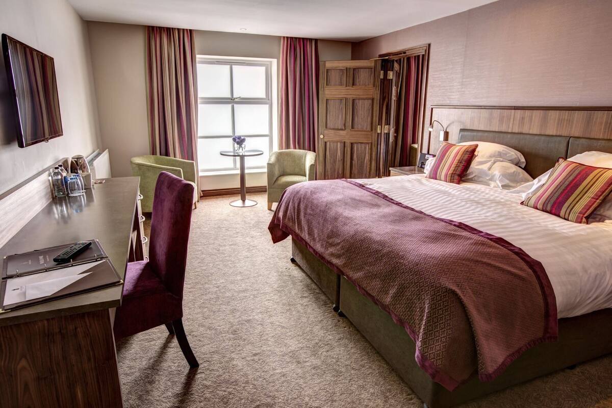 In-room safe, blackout curtains, iron/ironing board