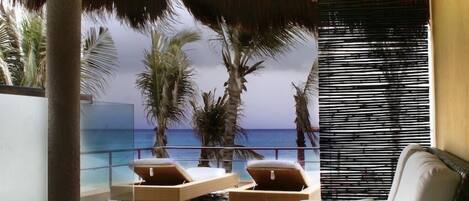 Suite, 1 letto king, vista oceano | Soggiorno | TV al plasma