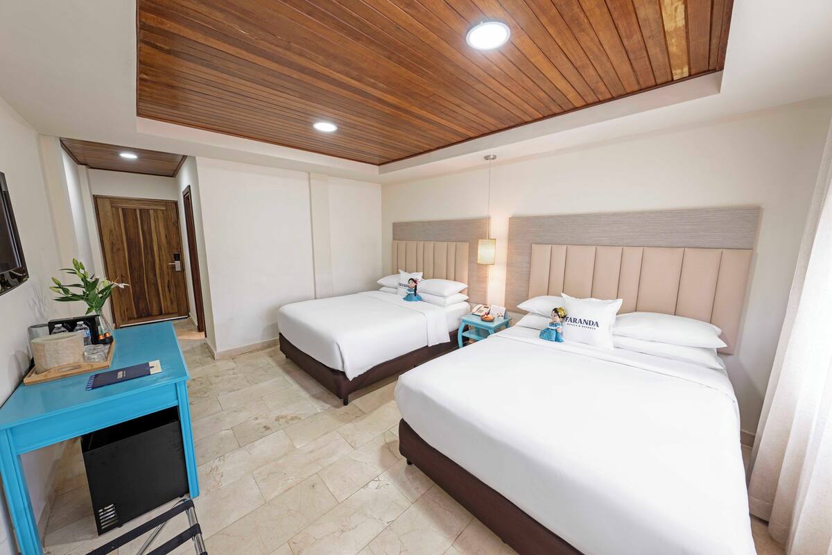 Premium bedding, down comforters, in-room safe, desk