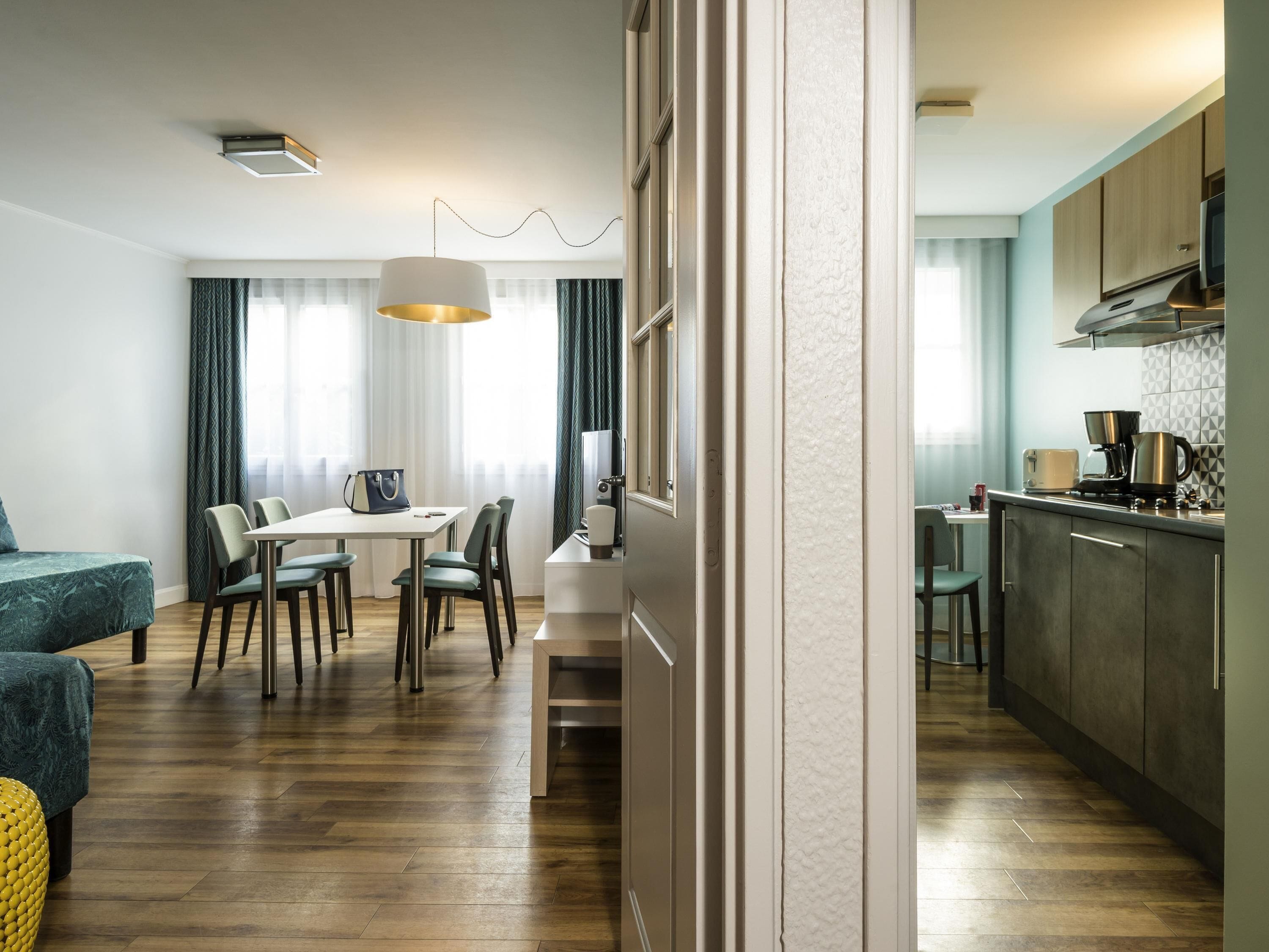 Apartment, 1 Bedroom | In-room safe, desk, blackout drapes, iron/ironing board