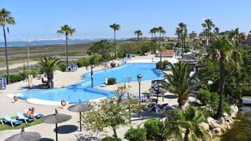Seasonal outdoor pool, pool loungers, lifeguards on site