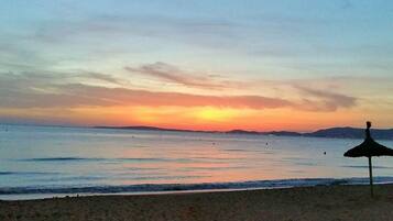 On the beach, beach towels