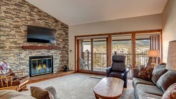 Condo, 2 Bedrooms, 2 Bathrooms | Living area | Flat-screen TV, fireplace