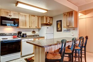 Full-sized fridge, microwave, stovetop, dishwasher - Trails End Condominiums by Great Western Lodging (Breckenridge)